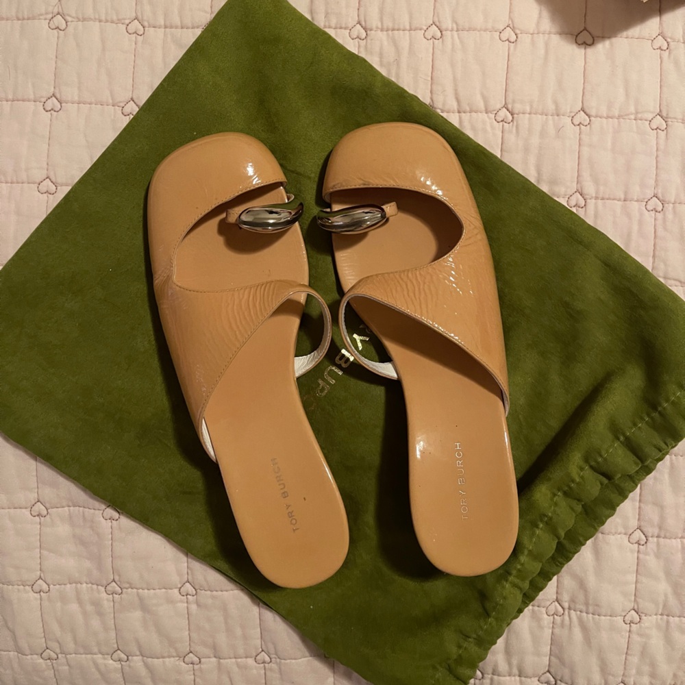 Tory Burch pierced wedge sold.